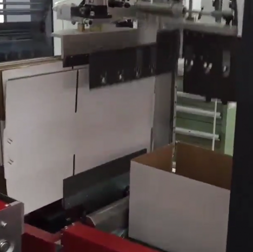 Érigeur de boîtiers à insertion automatique de goupilles