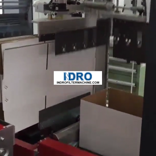 Érigeur de boîtiers à insertion automatique de goupilles